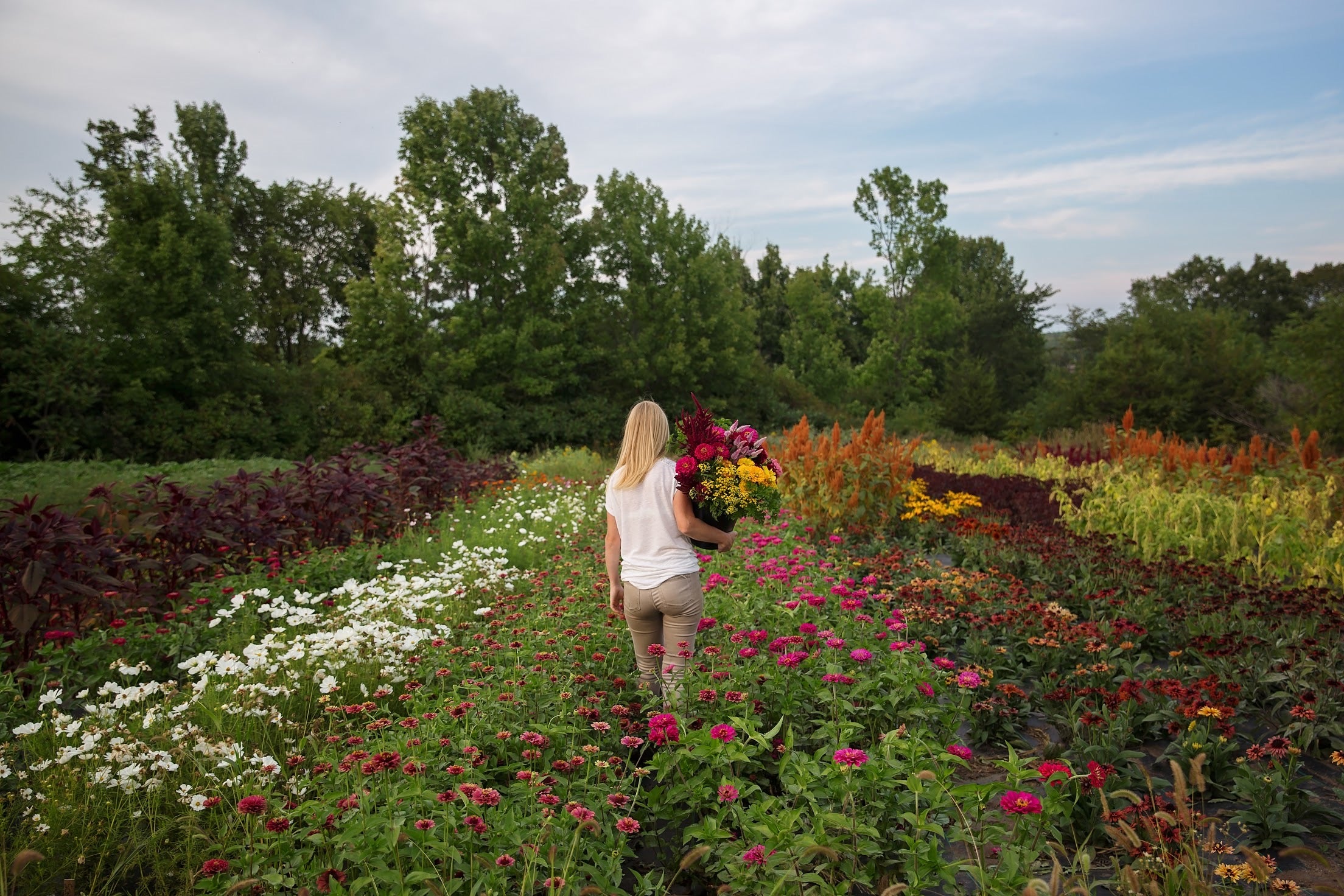 Farm owner Melanie working in field